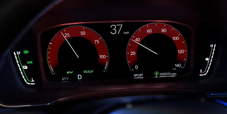 2026 Honda Civic Hatchback Sport Touring Hybrid digital instrument cluster with red gauges and speedometer (Compact Hatchback).